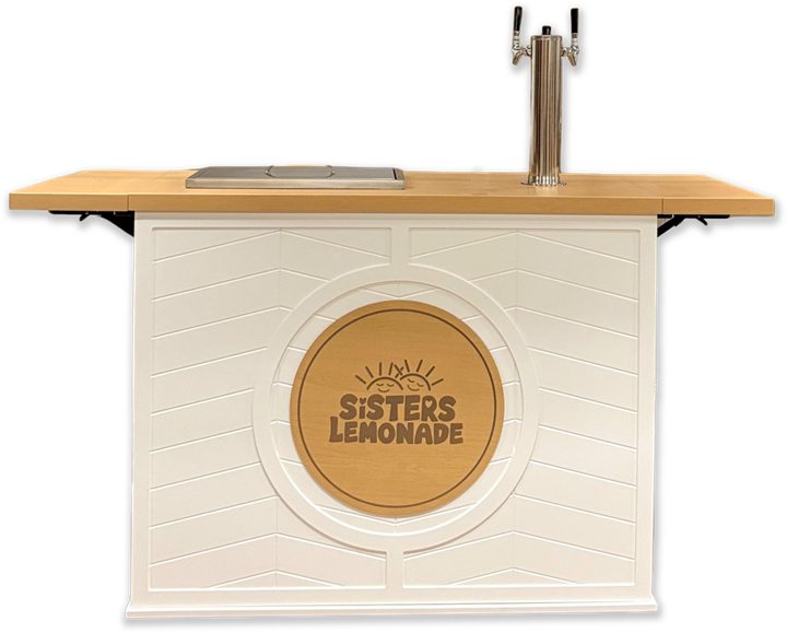 The Sisters Lemonade stand with a double tap tower and wooden counter